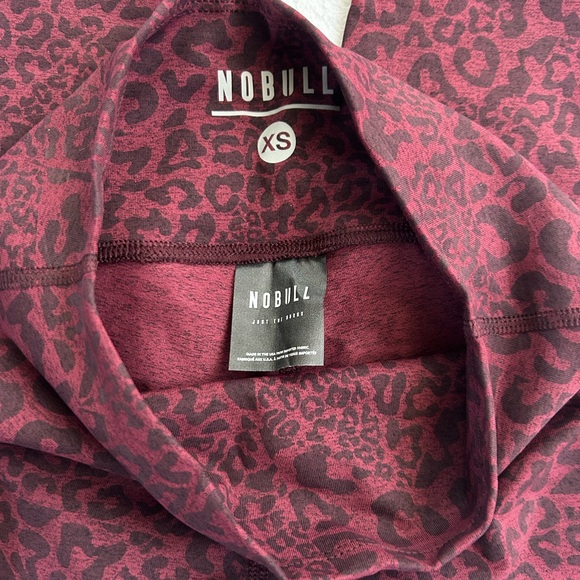 NOBULL High-Rise Plush Heather 21” Tight
Color: Wine Leopard - Picture 4 of 4